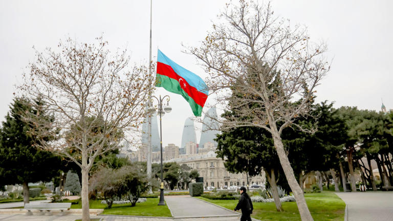 The Azerbaijani flag at half-mast in remembrance of the Azerbaijan Airlines crash victims.