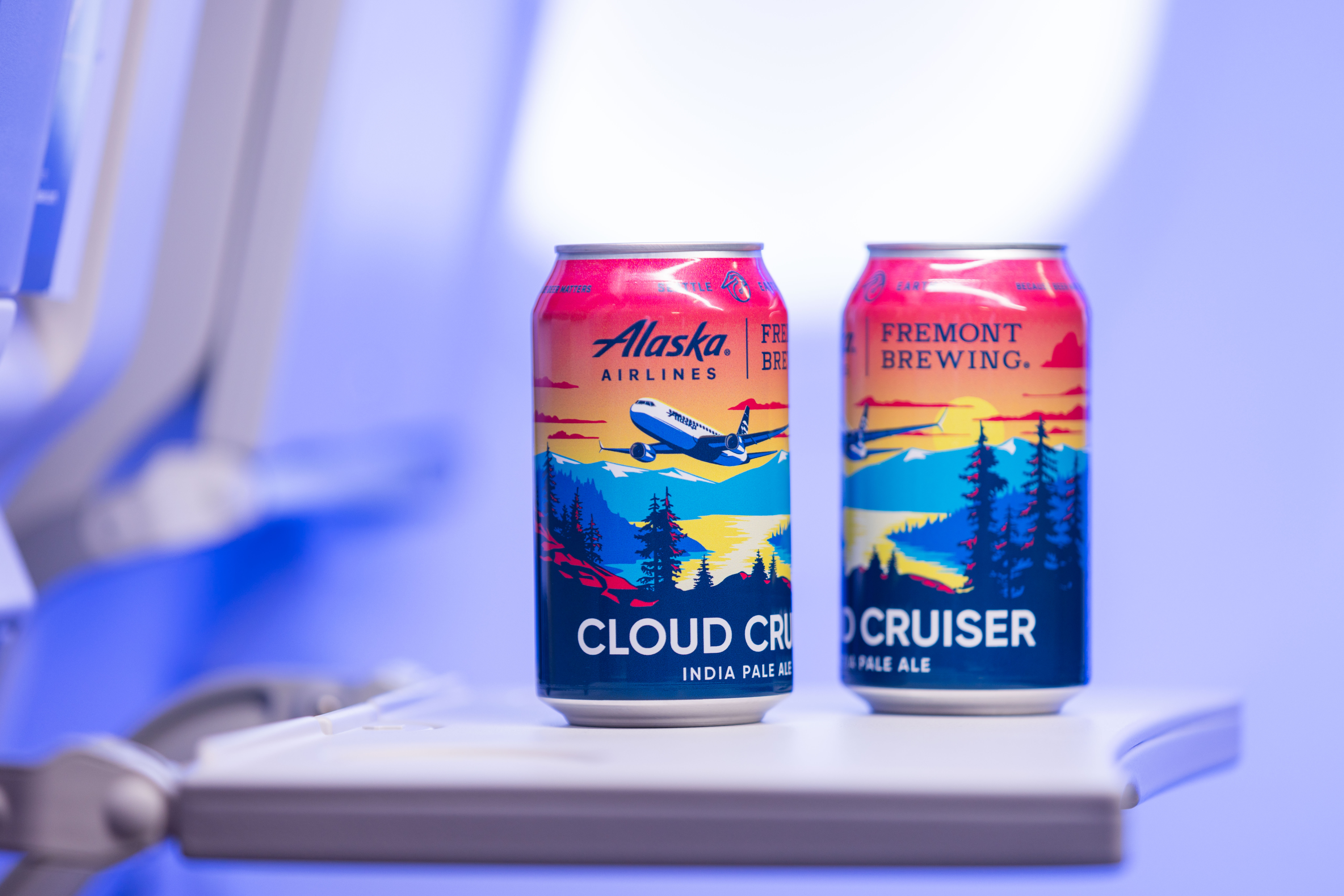 Two cans of Cloud Cruiser craft beer.