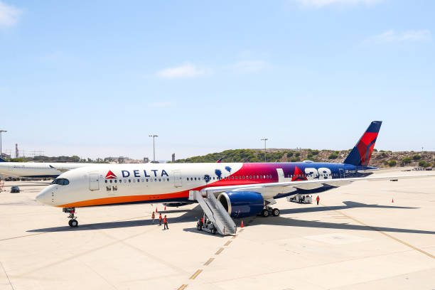 The Delta LA28 Livery sitting on a tarmac