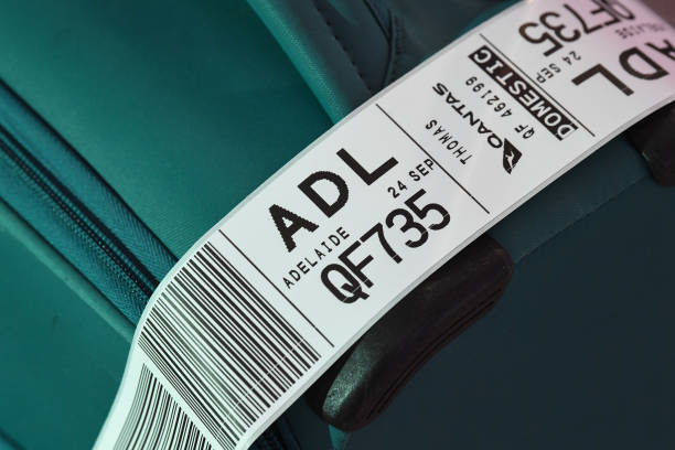 A baggage tag for the Qantas Boeing 737-800, flight number QF735 from Sydney to Adelaide at Sydney Airport on September 24, 2020 in Sydney, Australia.