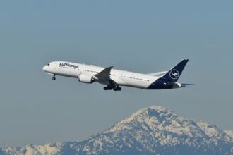 Lufthansa Boeing 787 flying above Vancouver.