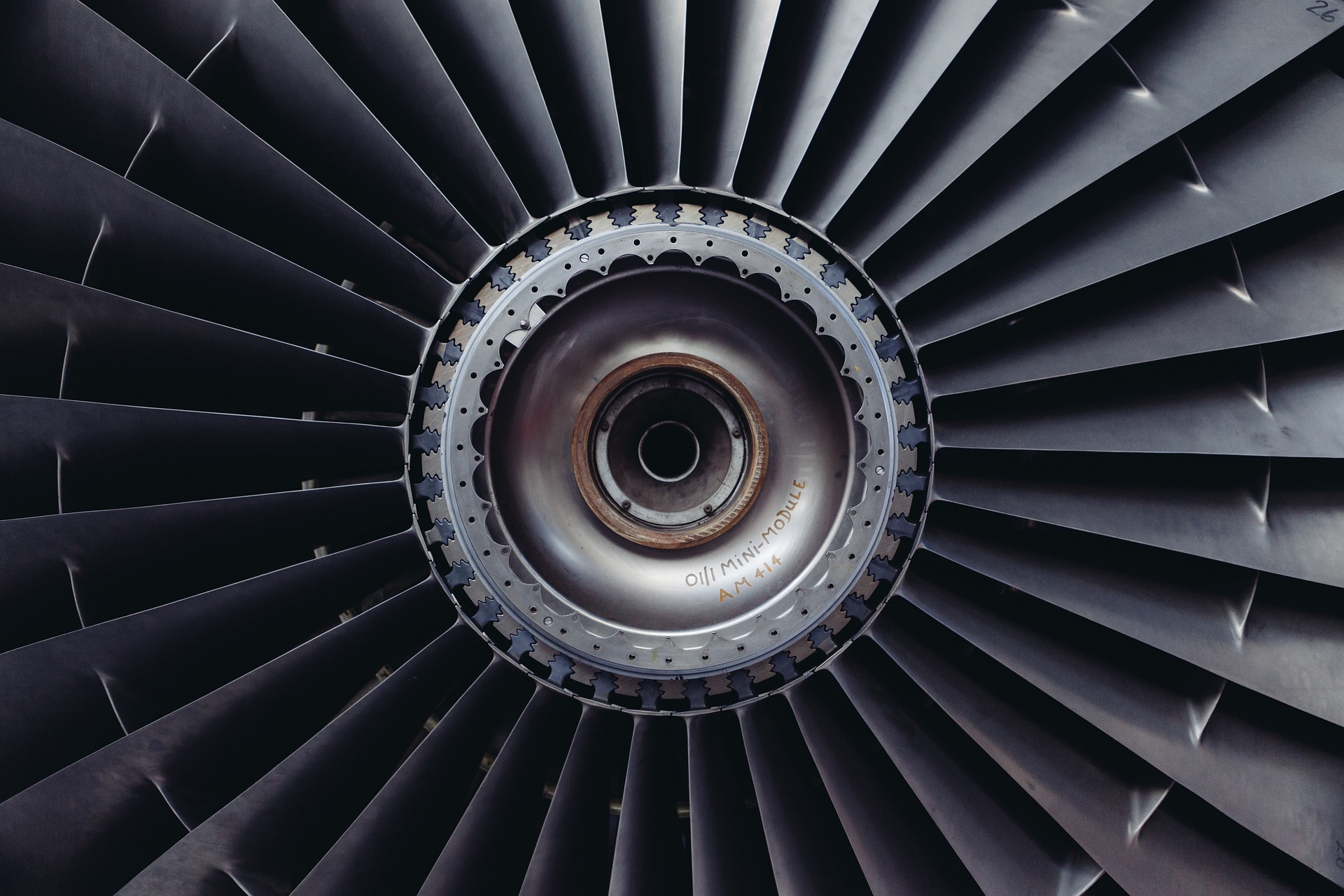 A close-up view of a jet engine turbine