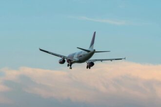 A passenger aeroplane flying in the sky.