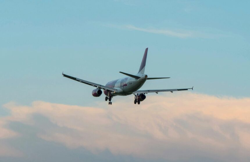 A passenger aeroplane flying in the sky.
