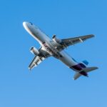 Eurowings flight overhead in blue sky- 2024 Summer Schedule expanded