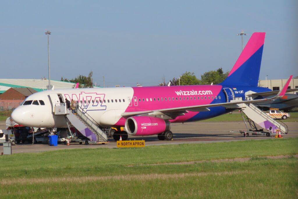 Wizz Air aircraft at Sibiu airport, showcasing the airline’s new routes and increased capacity for 2025