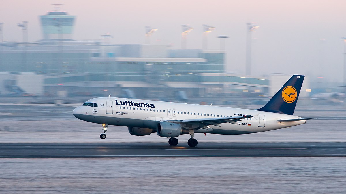 A Lufthansa Airbus A320-211 taking off.