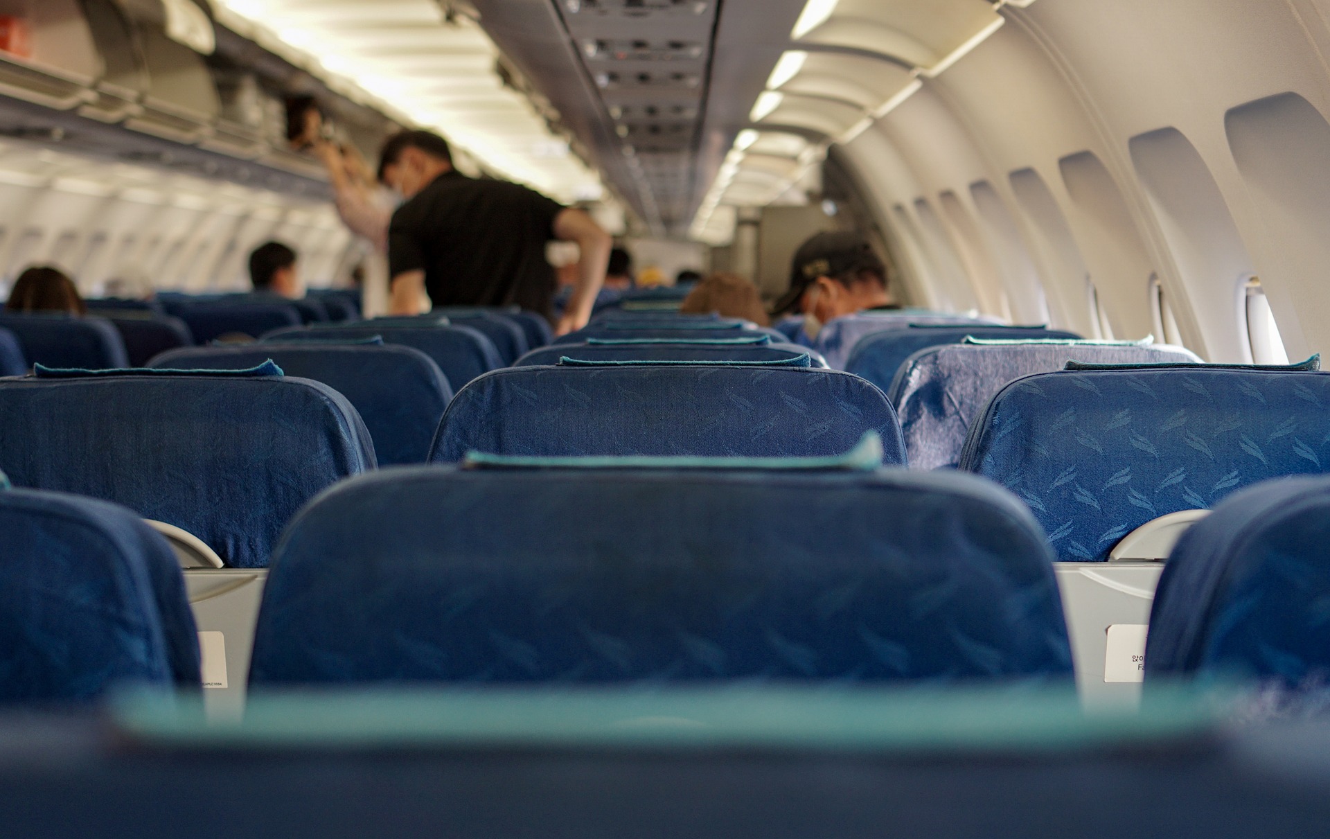 An aircraft cabin showing passenger seating.