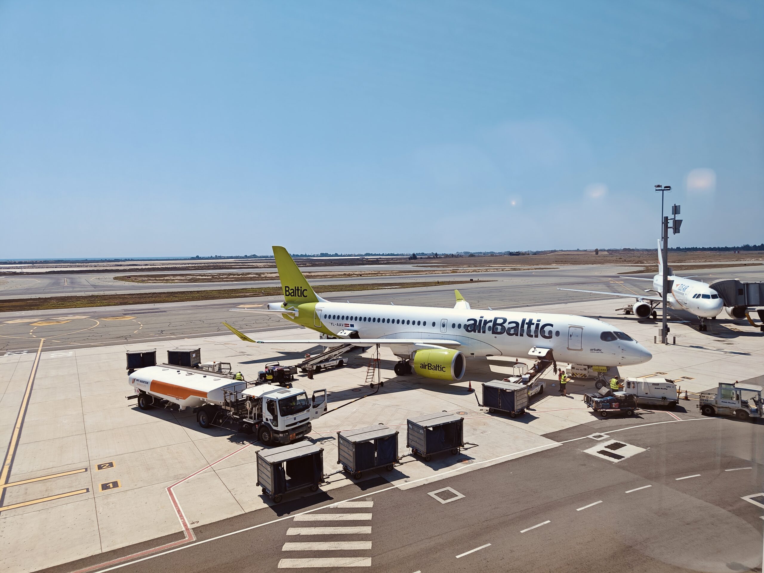AirBaltic Airbus A220-300 plane parked at Larnaca Airport Cyprus 2024