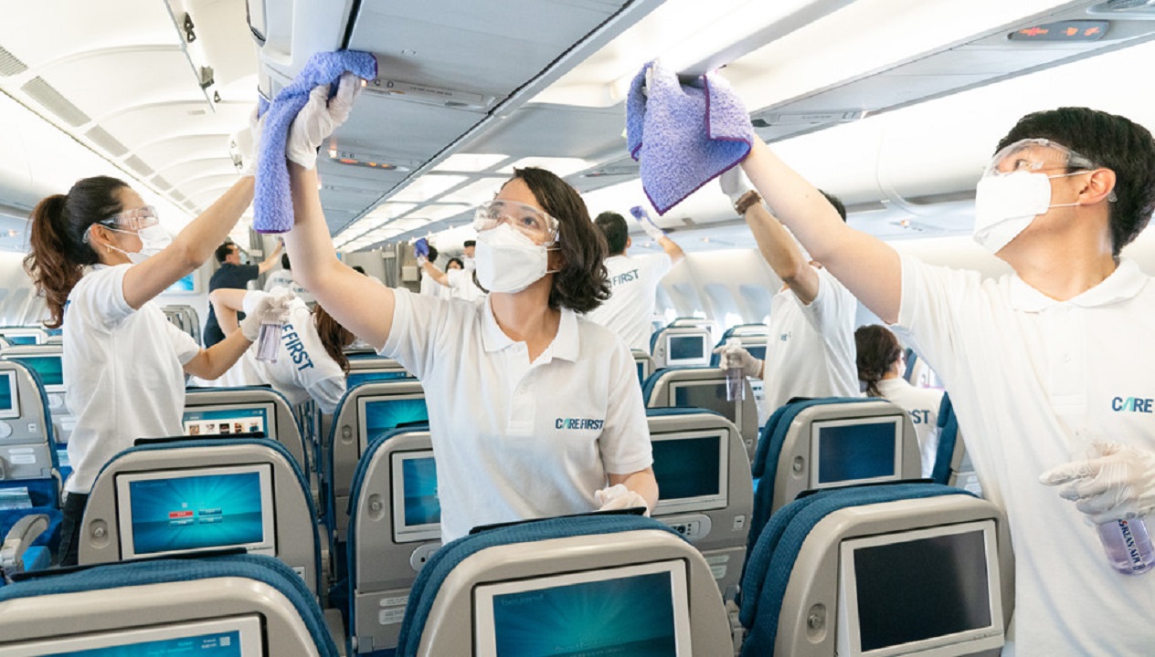 A team ensuring the cleanliness of a Korean Air aircraft
