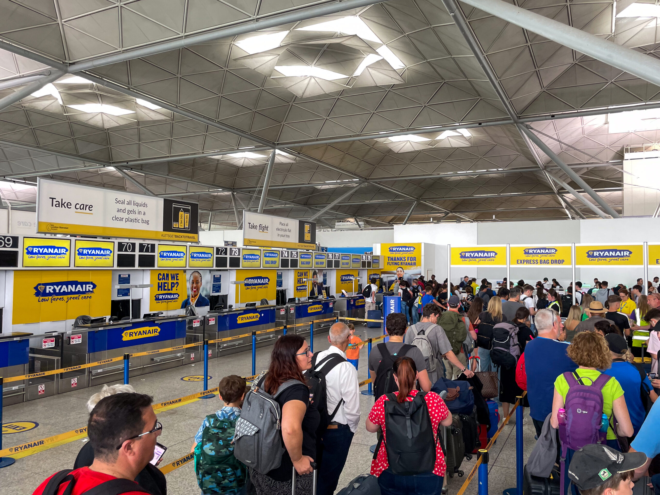 Ryanair check-in and bag drop line © Mike Peel 
