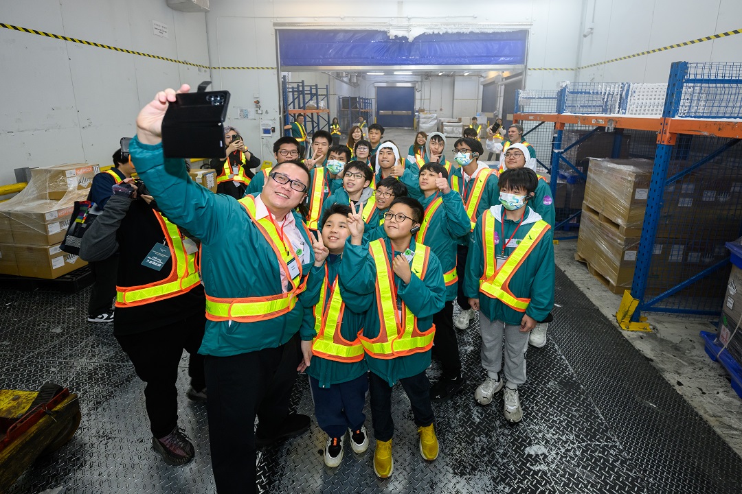 A group of young students on a tour as part of the programme