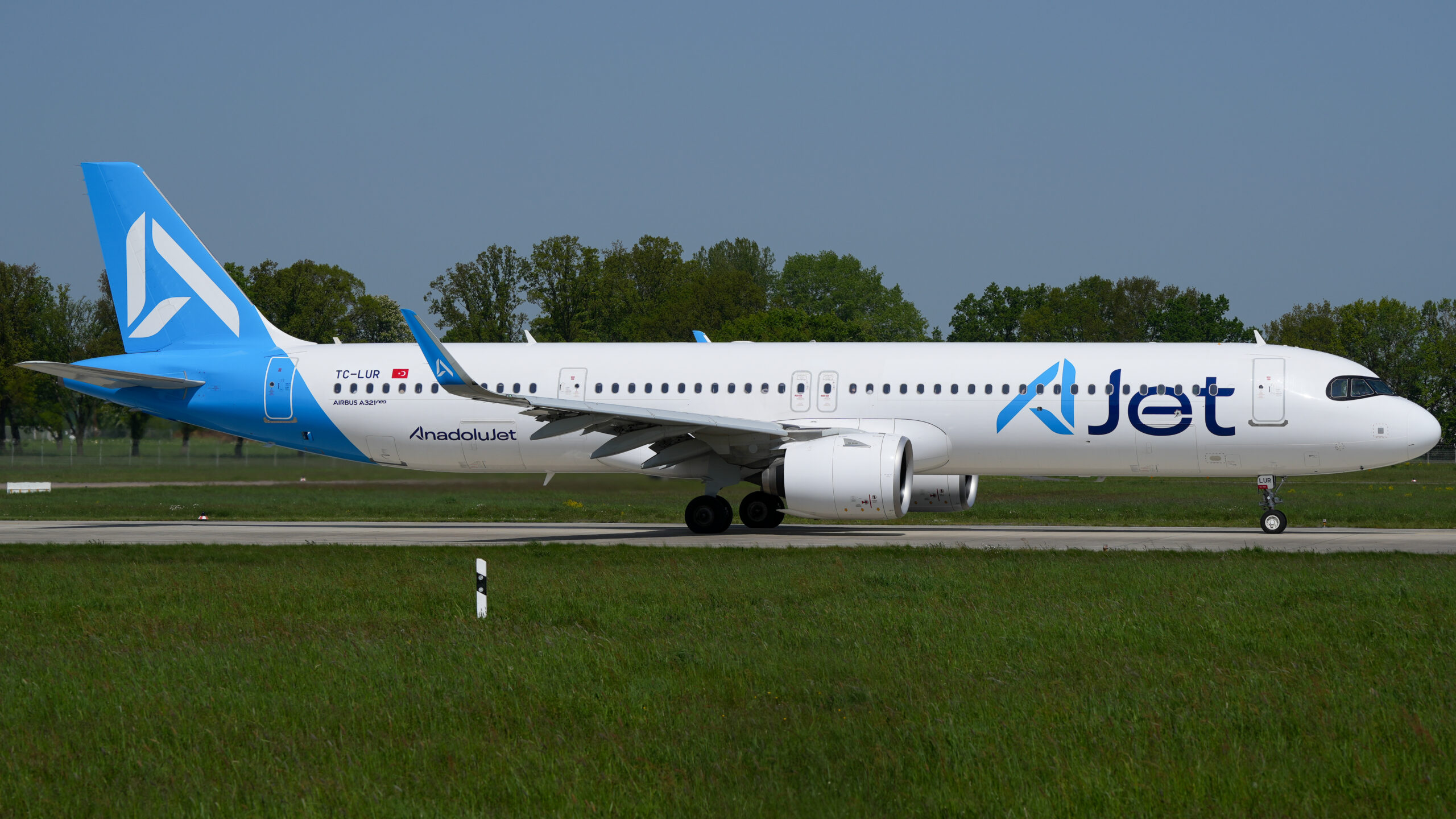 The AJet Airbus A321neo with the registration TC-LUR takes off from Hannover-Langenhagen Airport.