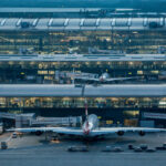 A view of an aircraft and the buildings of Heathrow Airport Terminal 5