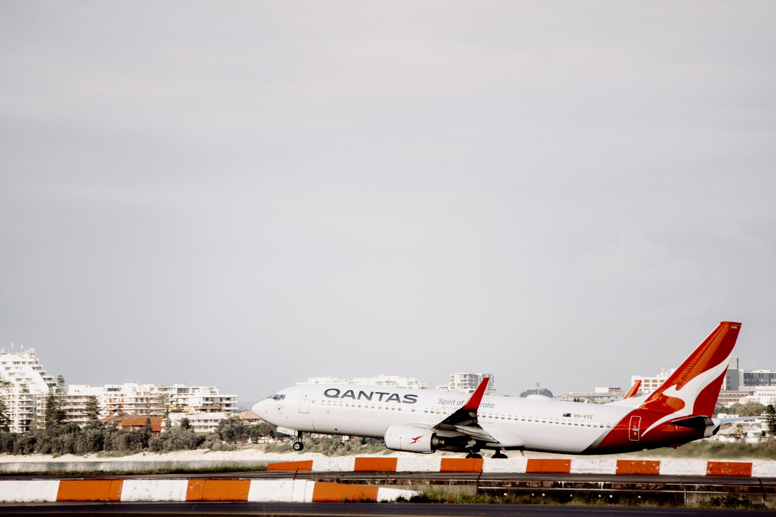 A Qantas flight taking off from Sydney International Airport. 