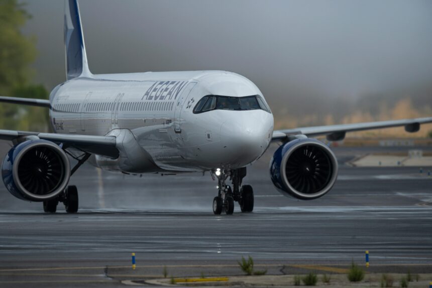 Airbus A321 on runway.