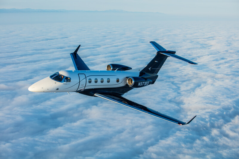 Embraer E-Jet aircraft, Phenom 300E, in the sky