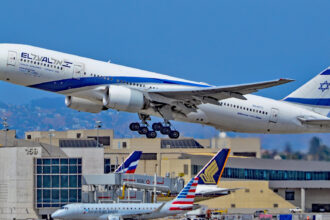 An EL AL Boeing 777-258 taking off from LAX.