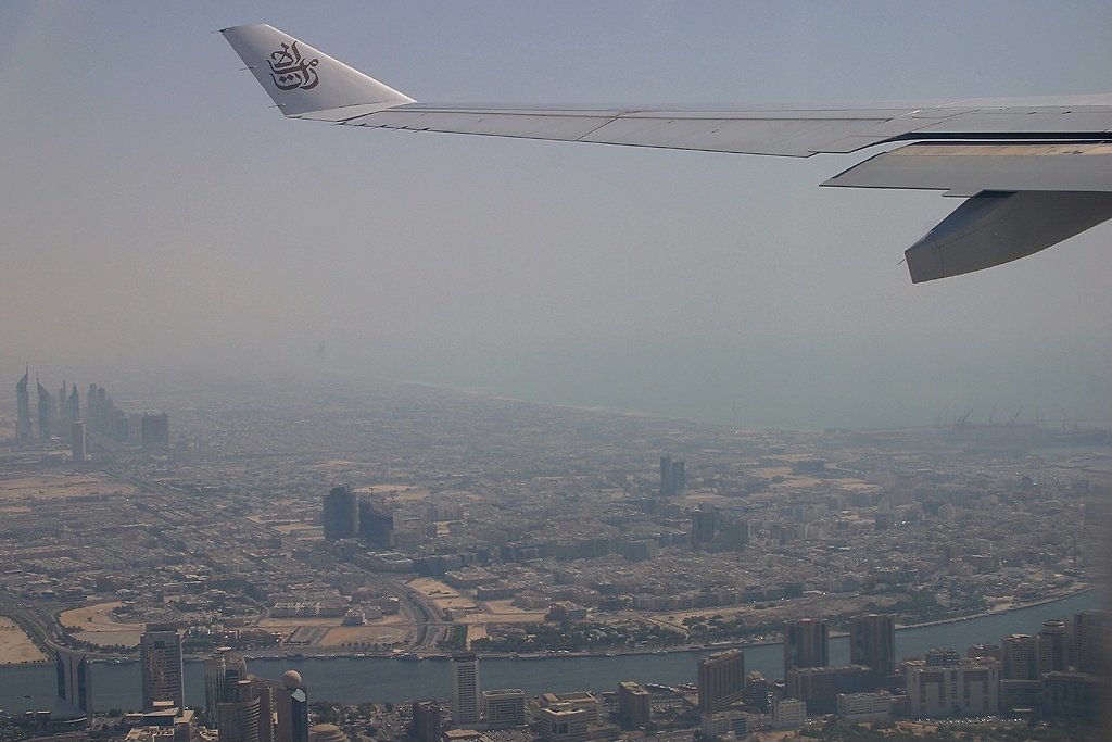 View from an Emirates A330 taking off over Dubai, with many of its landmarks visible