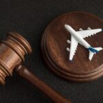 A gavel laying next to an aircraft