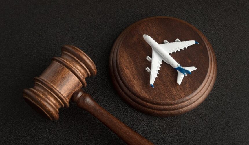 A gavel laying next to an aircraft
