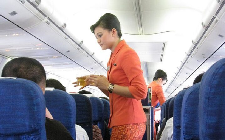 A flight attendant on a Garuda Indonesia
