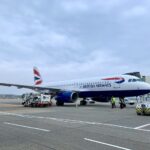 A British Airways commercial jet on the grounds of Gatwick Airport.