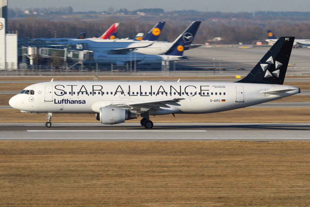 A Star Alliance aircraft operated by Lufthansa taking off from Munich Airport