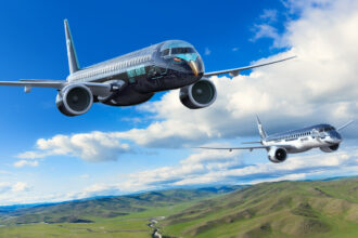 An image of the Embraer E195-E2 and E190-E2 aircraft flying in formation.