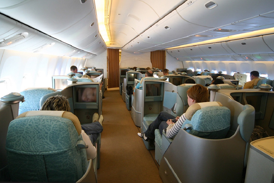 A business class cabin on an Etihad Boeing 777-300ER aircraft