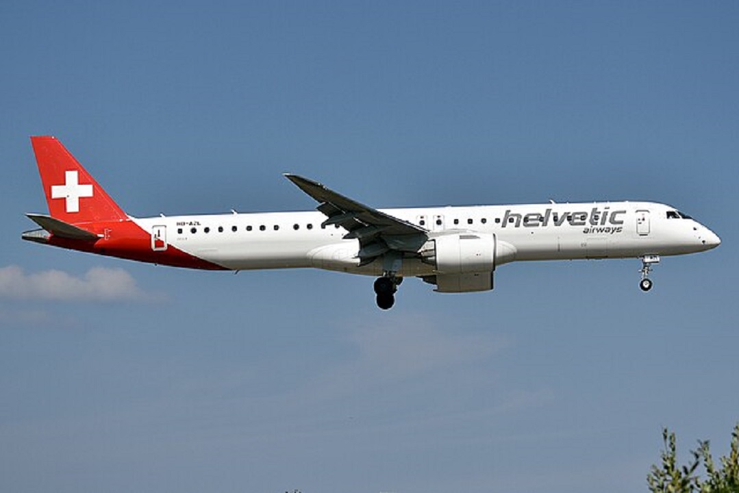A Helvetic E195-E2 aircraft in flight