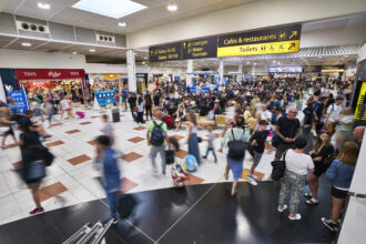 A busy North Terminal at London Gatwick Airport.