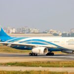 An Oman Air Airbus A330-343 on a runway