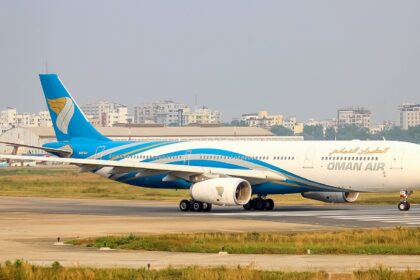 An Oman Air Airbus A330-343 on a runway