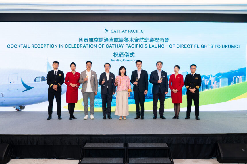 Secretary for Transport and Logistics of the Hong Kong SAR Government Mable Chan (centre), Cathay Group Chief Executive Officer Ronald Lam (fourth from right), Cathay Director Chinese Mainland Arnold Cheng (fourth from left), Cathay Director Cargo Tom Owen (third from right), Chairman of Xinjiang Association of Hong Kong Wang Xihua (third from left) celebrated the upcoming launch with Cathay Pacific crew