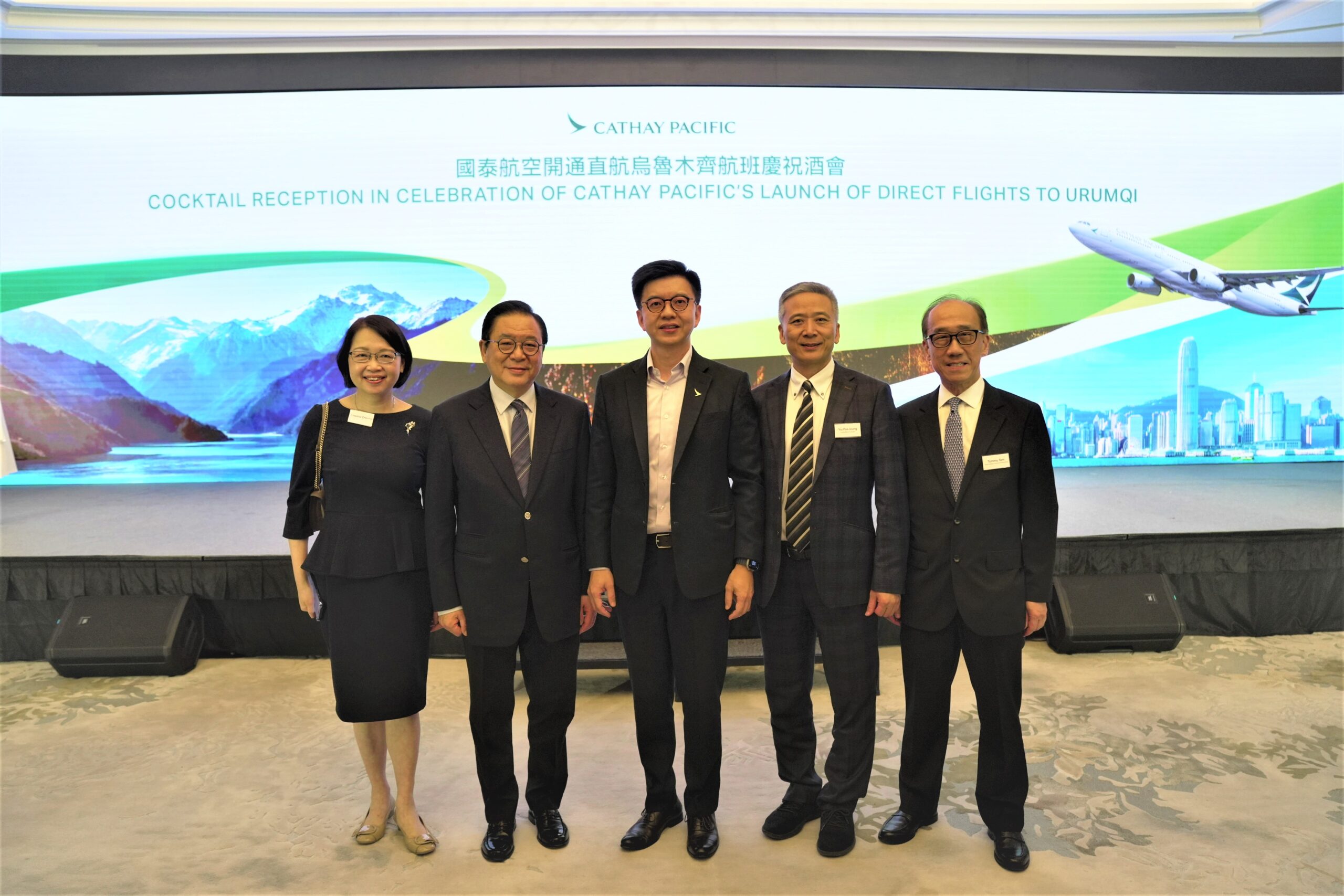 Cathay Group CEO Ronald Lam (centre), Non-Official Member of the Executive Council Jeffrey Lam (second from left), Legislative Council Member Perry Yiu (second from right), Commissioner for Tourism Angelina Cheung (first from left) and Chairman of the Travel Industry Council of Hong Kong Tommy Tam (first from right) attended the reception.