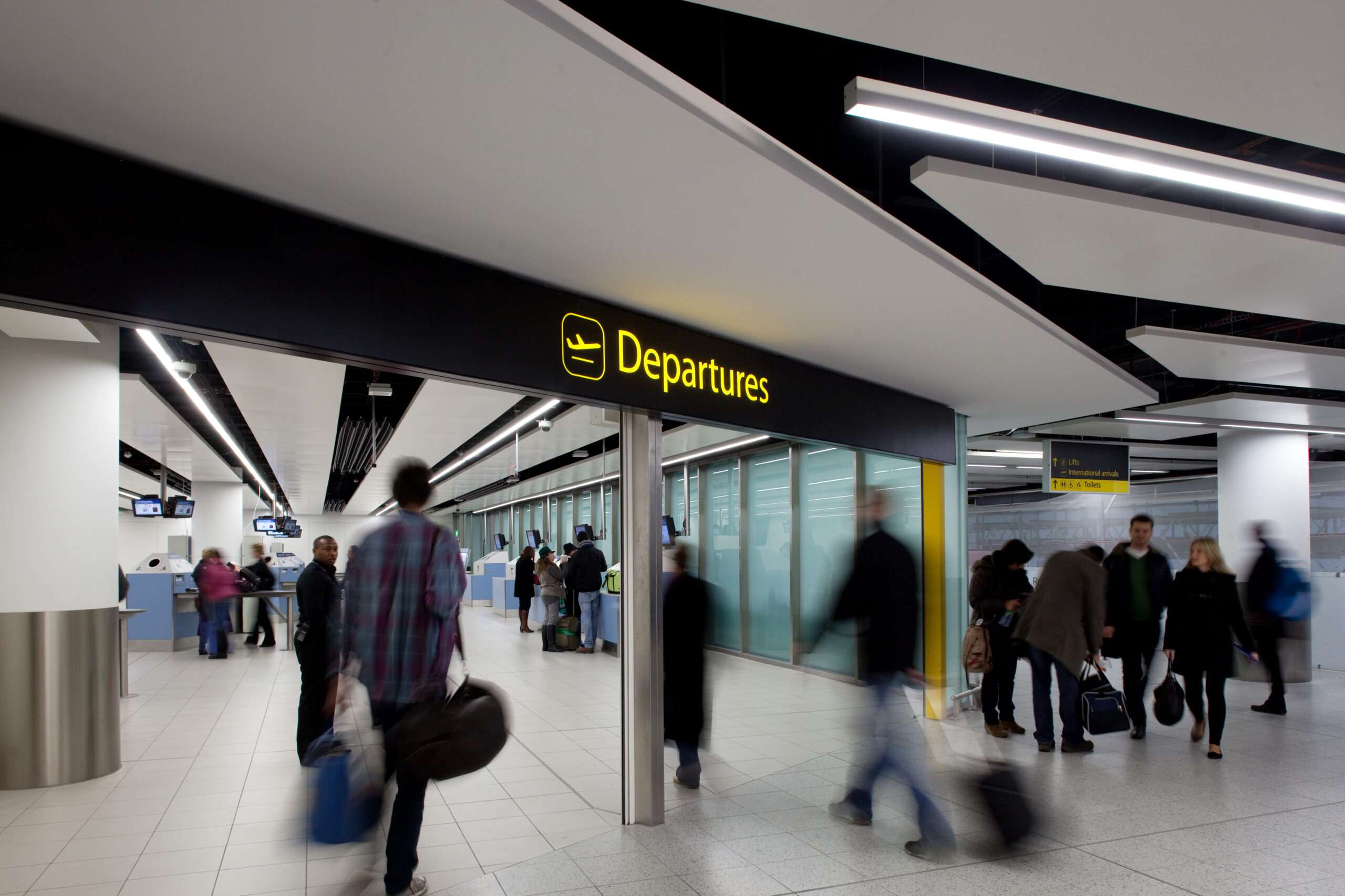 Passengers travel through to Departures at Gatwick.