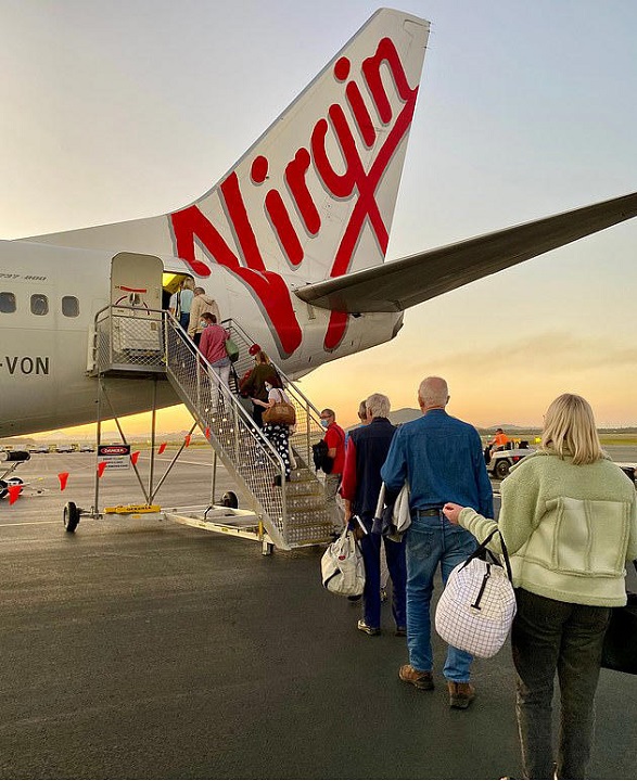 Passengers boarding a Virgin Australia flight
