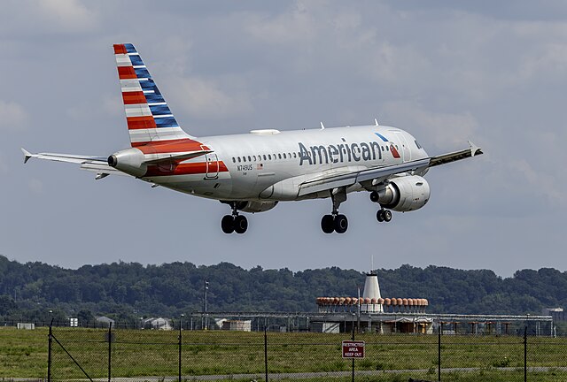 An American Airlines Airbus in flight over the grounds of Reagan Airport.