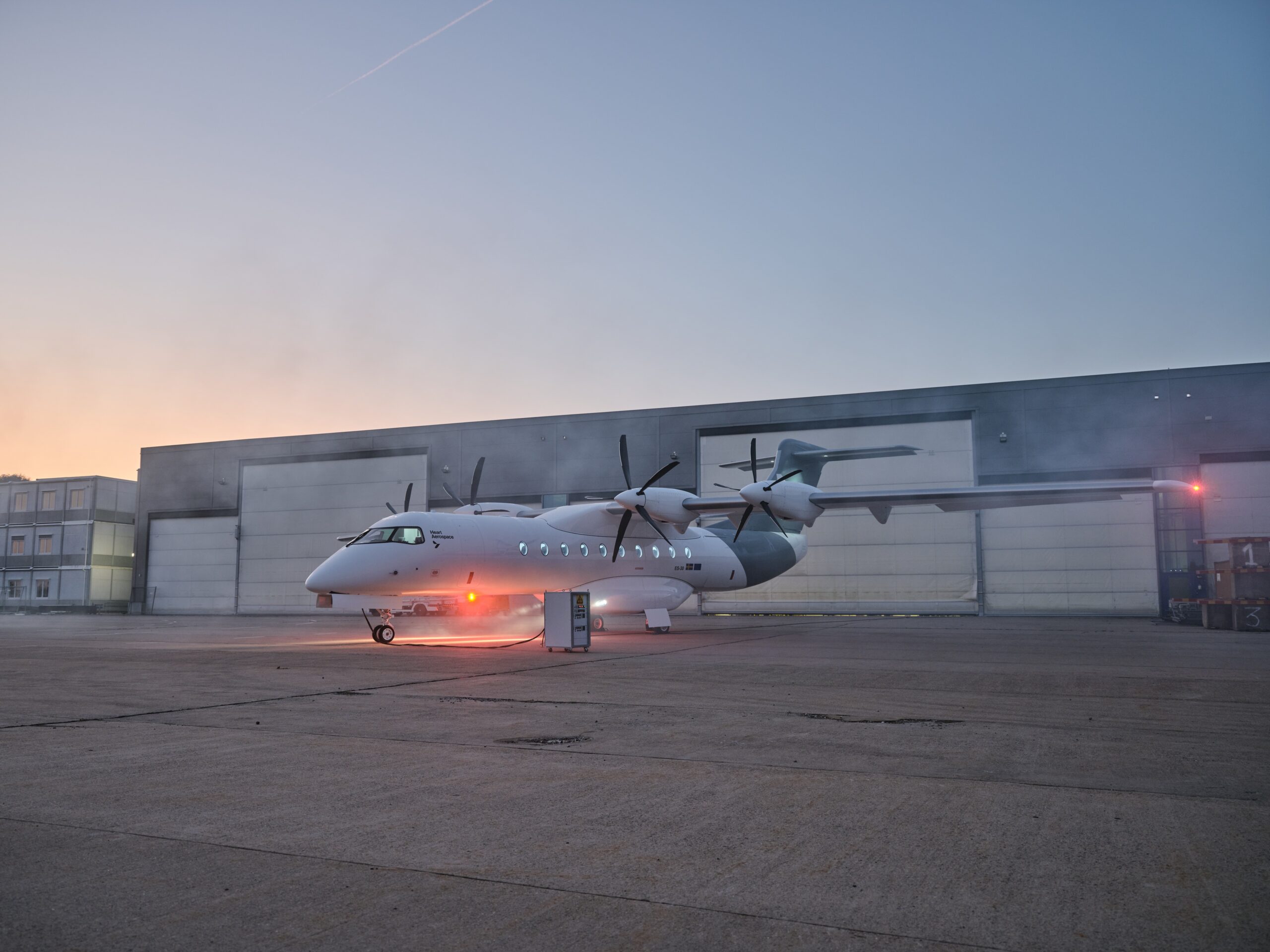 A photo of Heart Aerospace's prototype X1 outside a hangar