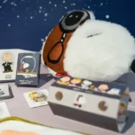 Snoopy-themed kids amenities kit on flight.
