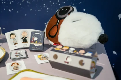Snoopy-themed kids amenities kit on flight.