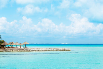 AUS TO CUN
