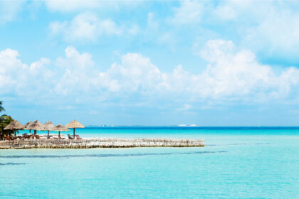 AUS TO CUN
