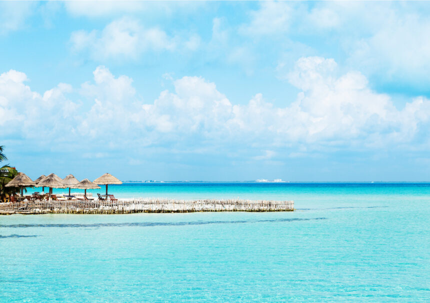 AUS TO CUN