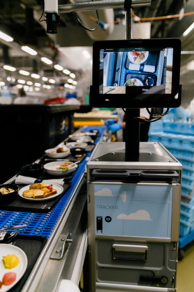 Meals make their way past the tray tracker and toward the dishwasher.