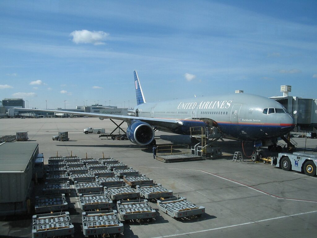 A photo of a United Airlines Boeing 777 being prepared for takeoff