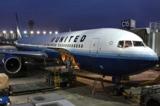 A photo of United Airlines Boeing 767-300 gets loaded at Chicago O'Hare