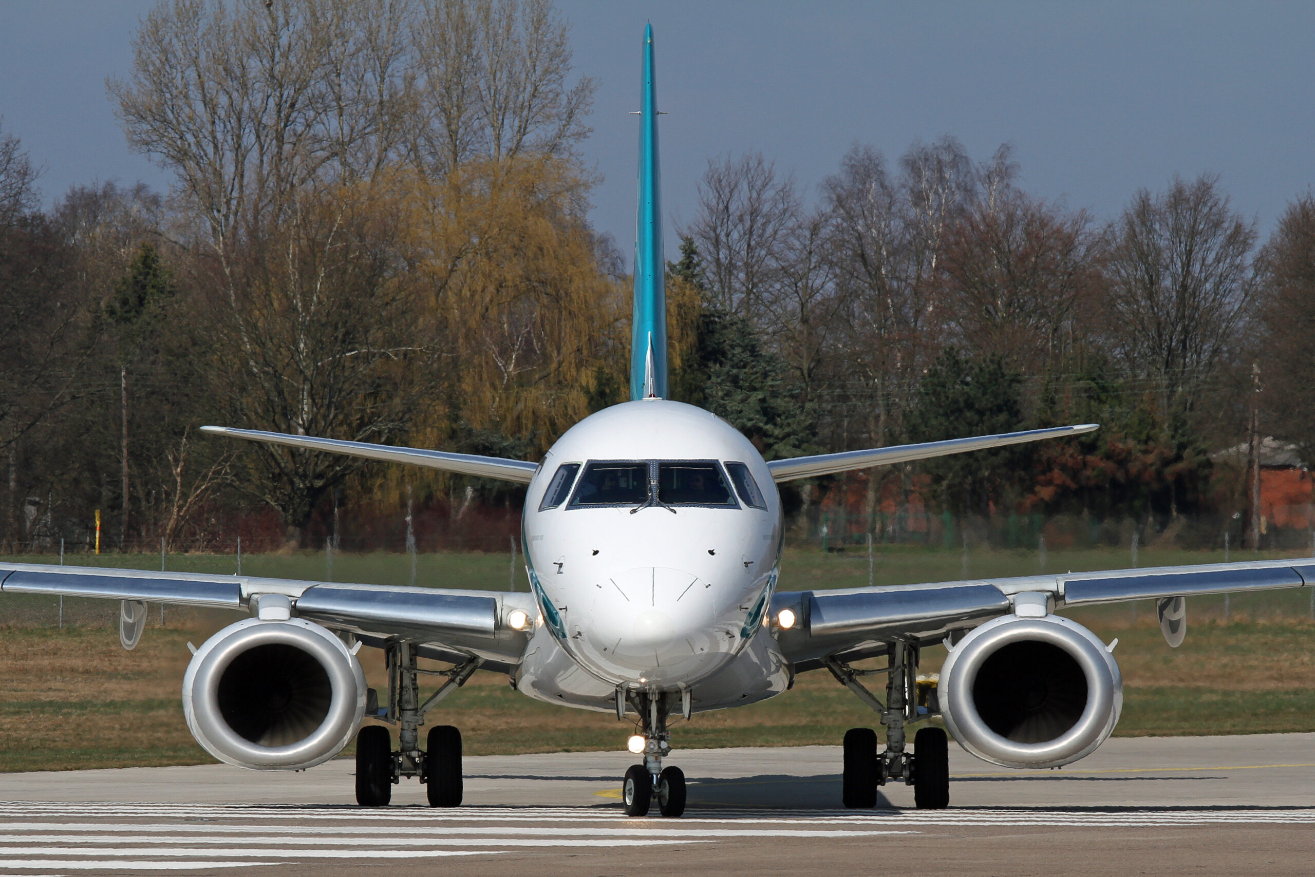 An image of the front of an Embraer E-Jet.