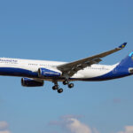An image of a RwandAir Airbus A330-243 on final approach into Toulouse Airport